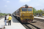 Local CommuterTrain arriving in Bang Pa-In. Thailand