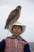 Woman with eagle, Yanque, Colca Canyon, Peru