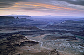 Stormy morning light over the Colorado River from Dead Horse Point, Dead Horse Point State Park, Utah, USA