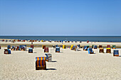 Beach chairs at beach near Norddorf, Amrum island, Schleswig-Holstein, Germany