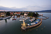 High angle view of the harbour with Bavarian Lion and Mang Tower, Lindau, Bavaria, Germany