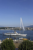 Excursion boat and Jet d'Eau (one of the largest fountains in the world), Lake Geneva, Geneva, Canton of Geneva, Switzerland
