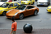 The Porsche and the poor man, status symbol in Chongqing, China, Asia