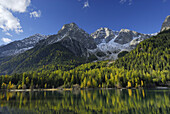 Lake Antholzer See in autumn, Rieserferner Group, South Tyrol, Italy