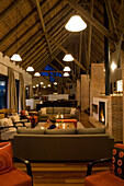 Interior view of the lounge at Forest Lodge in the evening, Gansbaai, South Africa, Africa