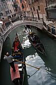 Gondolas on a canal, Venice, Veneto, Italy