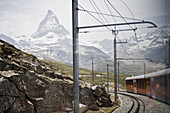 Mountain train passing through mountainous landscape, Zermatt, Matterhorn, Valais, Switzerland