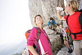 Hikers resting, Werdenfelser Land, Bavaria, Germany