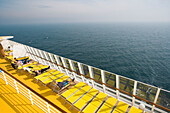 People on the sun deck of cruise ship AidaDiva