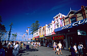 People at the Corso, a pedestrian area at the suburb of Manly, Sydney, New South Wales, Australia