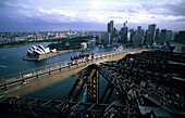 People standing on the highest steel beam of the Harbour Bridge, Sydney, New South Wales, Australia