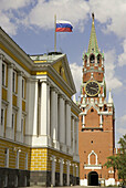 Russia. Moscow. Kremlin. Government building and Savior Gate Tower.