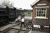 UK, England, North Yorkshire, Levisham, North Yorkshire Moors Railway, station platform, locomotive, booking office