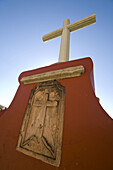 Cross in front of Church of San Cayetano, churrigueresque style, built 1700s, elaborate carvings  Valenciana, Mexico