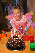 Little girl with birthday cake, Upper Bavaria, Germany