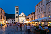 People at sidewalk cafes in the Old Town in the evening, Hvar, Hvar Island, Dalmatia, Croatia, Europe