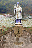 Statue of St Florian, The Way of St. James, Chemins de Saint Jacques, Via Podiensis, Estaing, Dept. Aveyron, Région Midi-Pyrénées, France, Europe