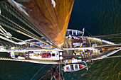 Overview from the mast down to the deck of the Schooner Nathaniel Bowditch, sailing on Holbrook Bay, Gulf of Maine, Maine USA