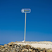 Island of Folegandros, Cyclades, Greece. desolated sign for the beach of Livadaki.
