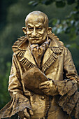 A street performer poses in the Eids Volls Plassen park in Oslo, Norway