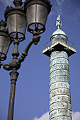 Column of Place Vendome with Napoleon's statue on top. Paris. France