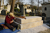 A mason working on a new tomb in Cimetiere du Pere Lachaise. Paris. France
