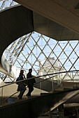 The interior view of Pyramid Entrance of Musee du Louvre. Paris. France