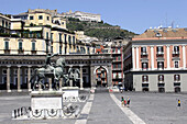 The equestrian bronze statues of Charles III of Borbone and Ferdinando I on the Piazza del Plebiscito. Naples. Campania. Italy