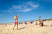 Women playing beach tennis, Westerland, Sylt Island, Schleswig-Holstein, Germany