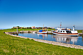 Boats in harbor, Oland hallig, North Frisian Islands, Schleswig-Holstein, Germany