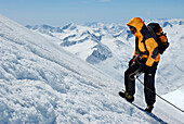 Mountaineers, climbers in Winter clothing ascending the mountain, Mountain landscape, Wildspitze, South Tyrol, Italy