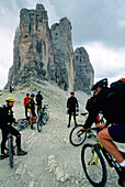 Mountain bike tour in the mountains, Three Peeks, Tre Cimi di Lavaredo, Sexten Dolomites, South Tyrol, Italy