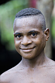 Smiling Papuan boy, Indonesia