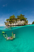 Woman snorkeling in Palau, Micronesia, Palau