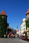 Viru shopping street with cafes, Towers from the city walls, Tallinn, Estonia