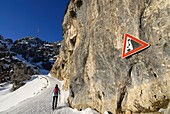 Female backcountry skiier ascending, Wendelstein range, Bavarian Alps, Bavaria, Germany