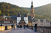 Karl-Theodor Bridge with gate and church of th Holy Spirit, Old Town, Heidelberg, Baden-Wuerttemberg, Germany