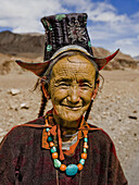 60 to 65 years, 60 to 70 years, 60-65 years, 60-70 years, Face, Himalaya, Himalayas, India, Jewelry, Ladakh, Leh, Mountains, Old, Portrait, Sixties, Smile, Woman, Wrinkles, F17-704591, agefotostock