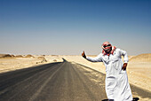 North west desert, road and Bedouin hitch hiking. Egypt