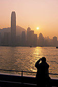 Man taking picture, Hong Kong Island Skyline, Hong Kong, China