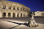 Arènes, roman arena, toreador statue. Nîmes. Provence. France.