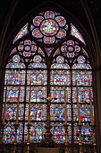 France, Paris, Notre Dame Cathedral interior, stained glass window