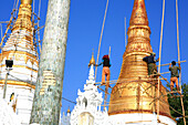 Workers on bamboo scaffold at the Shwedagon Pagoda, Rangoon, Myanmar, Burma, Asia