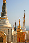 Stupas of the Taung Tho Kyaung Pagoda in the sunlight, Shan State, Myanmar, Burma, Asia