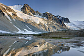 Glaciated Peaks of Boulder/Salal Divide reflected in waters of Salal Creek near Athelney Pass, Coast Range British Columbia Canada