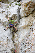 Man rock climbing, City of Rocks, Idaho, USA