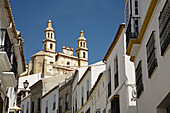 Street and church of Nuestra Señora de la Encarnacion, Olvera. Pueblos Blancos (white towns), Cadiz province, Andalucia, Spain
