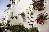 Ornate cross for May Days of the Cross fest, Mijas. Pueblos Blancos (white towns), Costa del Sol, Malaga province, Andalucia, Spain