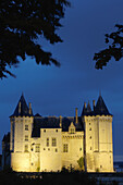 Saumur Castle (Chateau de Saumur) at dusk. Maine_et_Loire . Saumur. Loire Valley. France