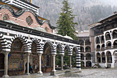 Rila monastery, inner court, Mary`s Birth Church and residential building, view to the surrounding forests, Bulgaria